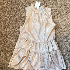 Chic Cream Sleeveless Blouse